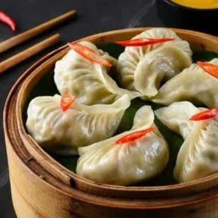Chicken Cheese Momos {steam}(10 Pcs.)  [Street and straw]