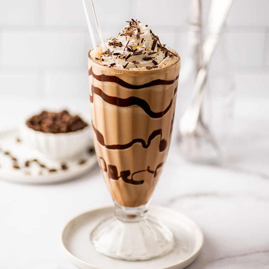 Cold coffee with ice cream  [street and straw]