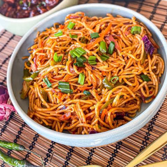Egg schezwan noodles  (Street and straw)