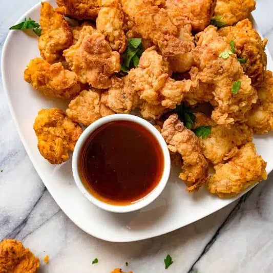 Chicken popcorn  [street and straw]